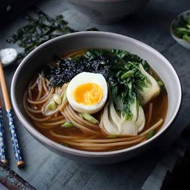 ceramic ramen bowl with chopsticks