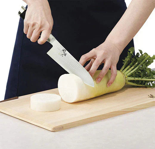 japanese knife cutting a radish